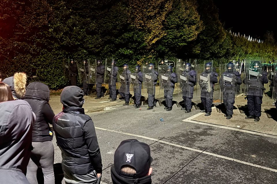 Gardaí block protesters near the Citywest Hotel in Saggart earlier this week. Photo: Niall Carson/PA